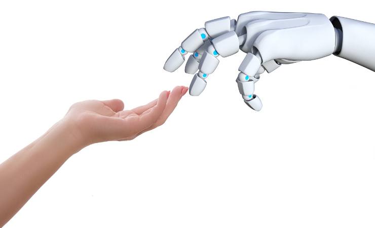 Connessione mano tra robot e uomo